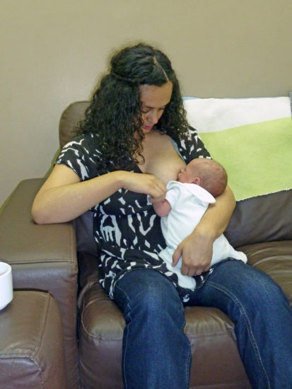 Breastfeeding in a straddle hold
