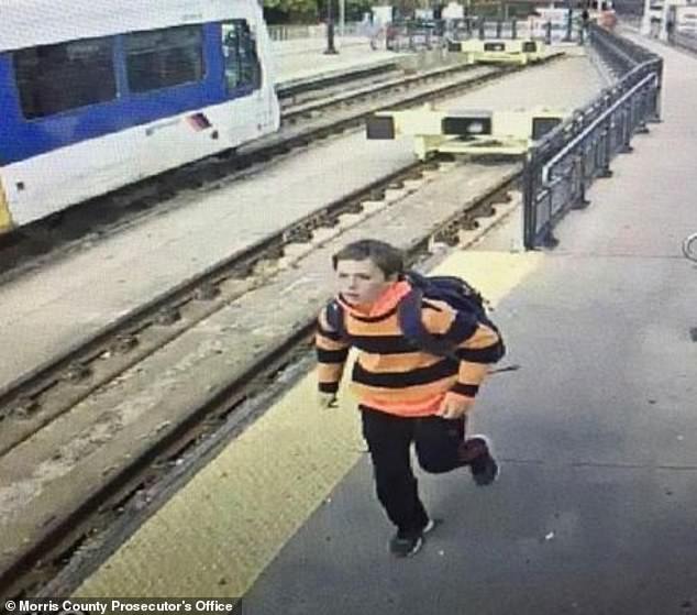 A photo shows him at the Walter Rand Train Station in Camden, New Jersey, wearing an orange and black striped shirt with a backpack on November 3. He took a train to Penn Station afterwards and then went to Philadelphia 